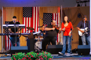 A band playing music for Independence Day in for Staunton's "Happy Birthday America" event