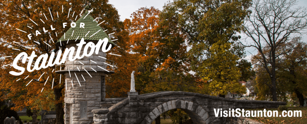 Fall for staunton hero image with fall foliage behind a historic castle gate