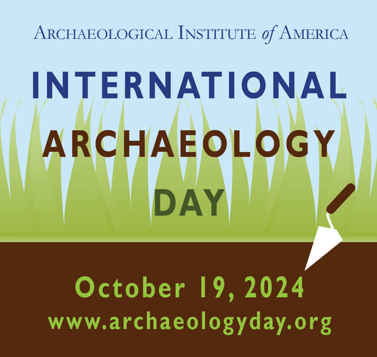 A diverse group of archaeologists celebrating International Archaeology Day with artifacts and educational displays