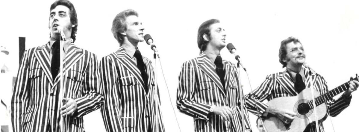 Four Statler brothers perform together onstage